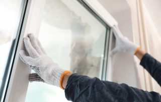 Installer installing a window - 6 Keys to a Proper Replacement Window Installation